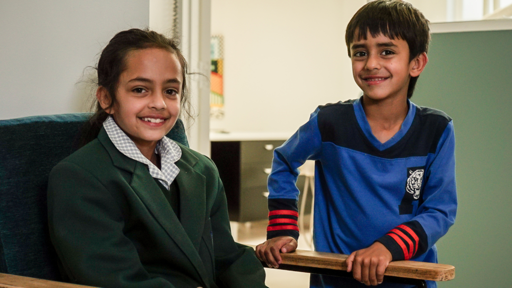 Girl and Boy looking at camera